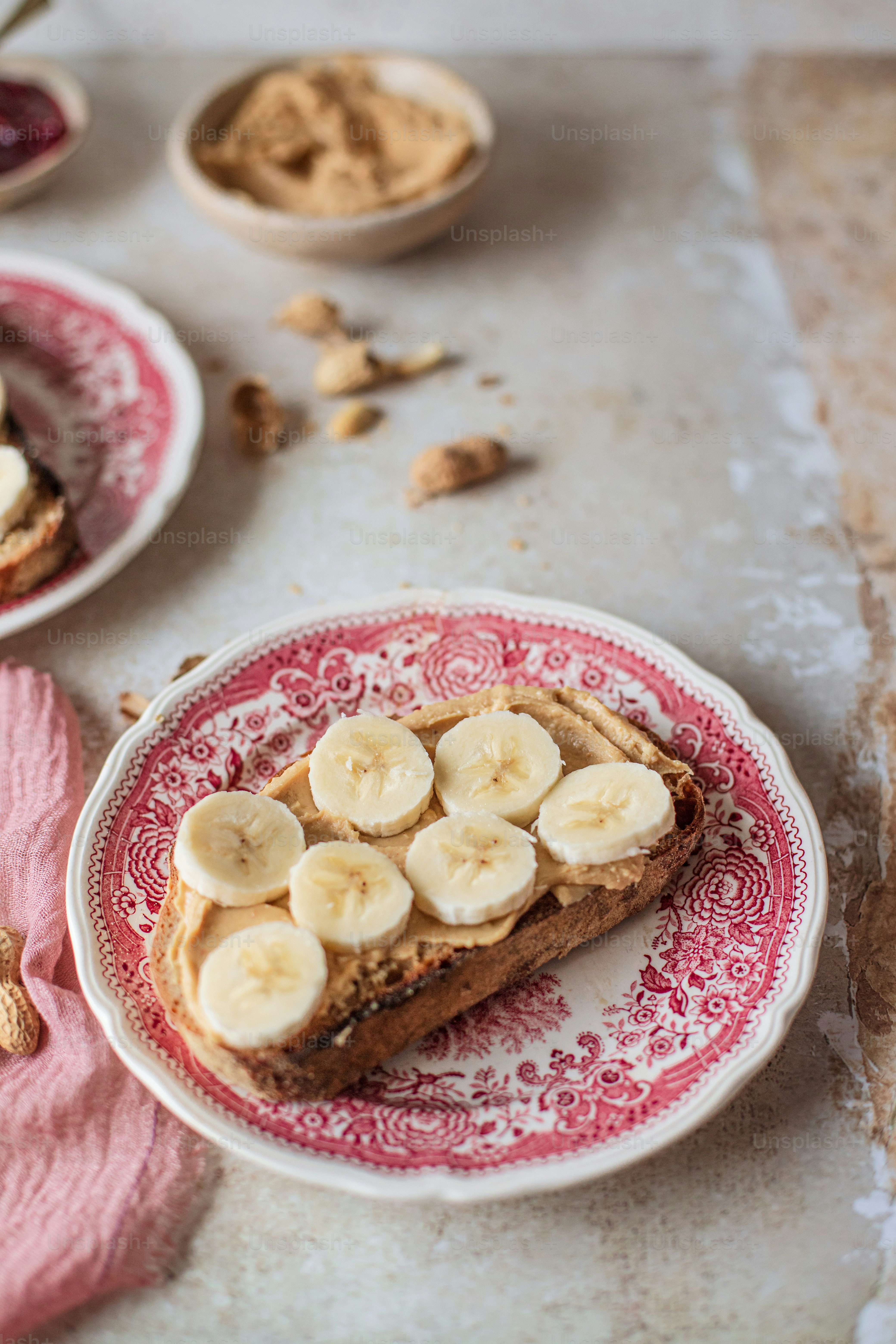 a piece of toast with banana slices on a plate