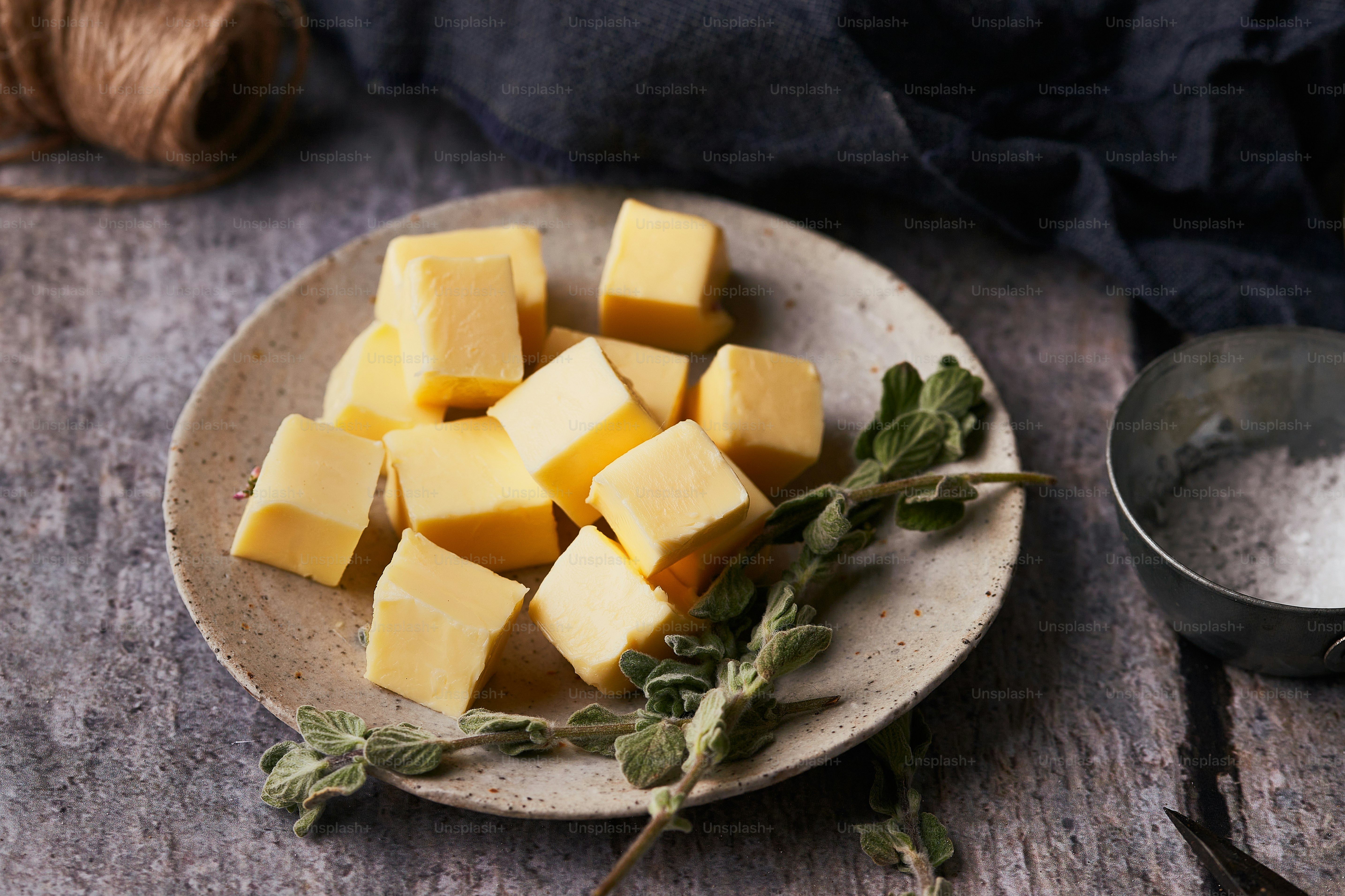 A plate of butter cubes on a table photo – Food Image on Unsplash