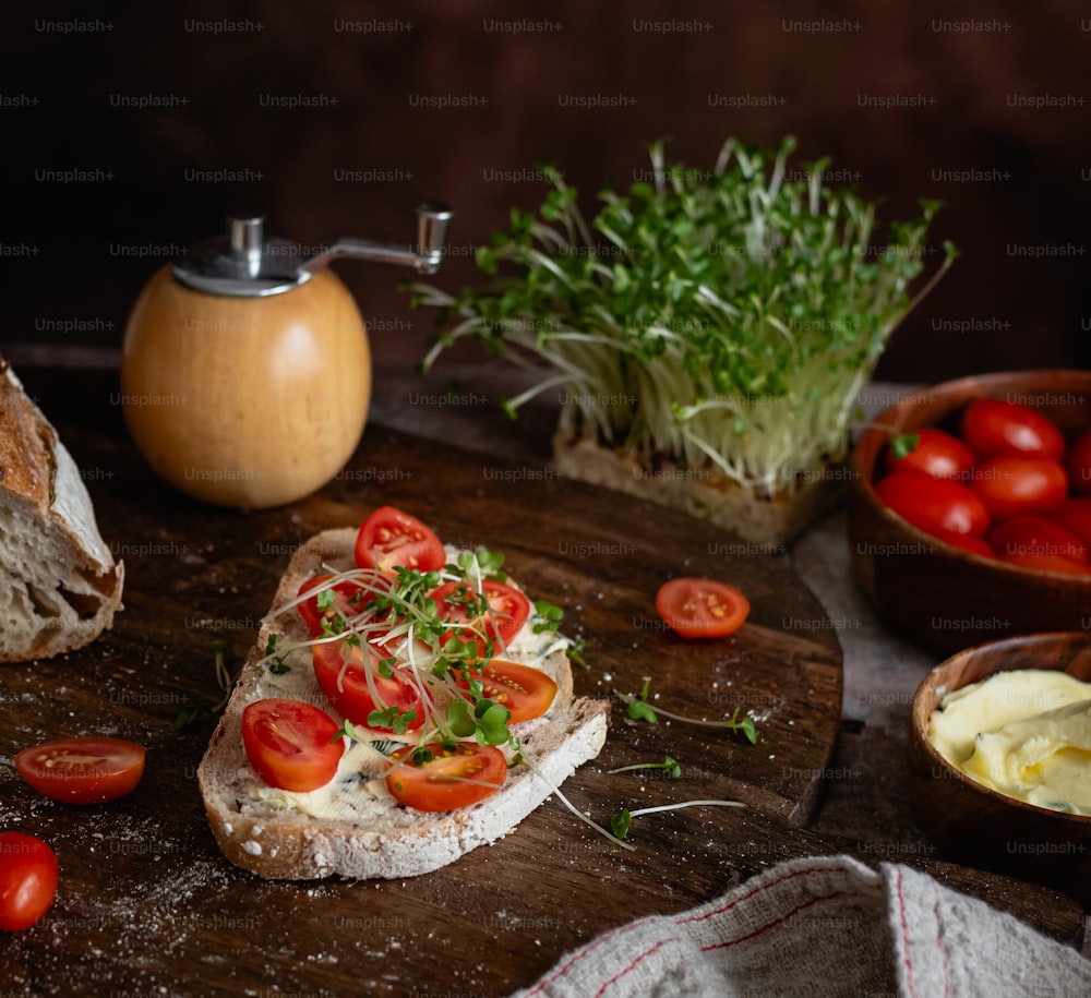 a wooden cutting board topped with a piece of bread