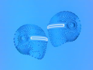 un paio di scarpe blu che hanno la forma di un paio di scarpe