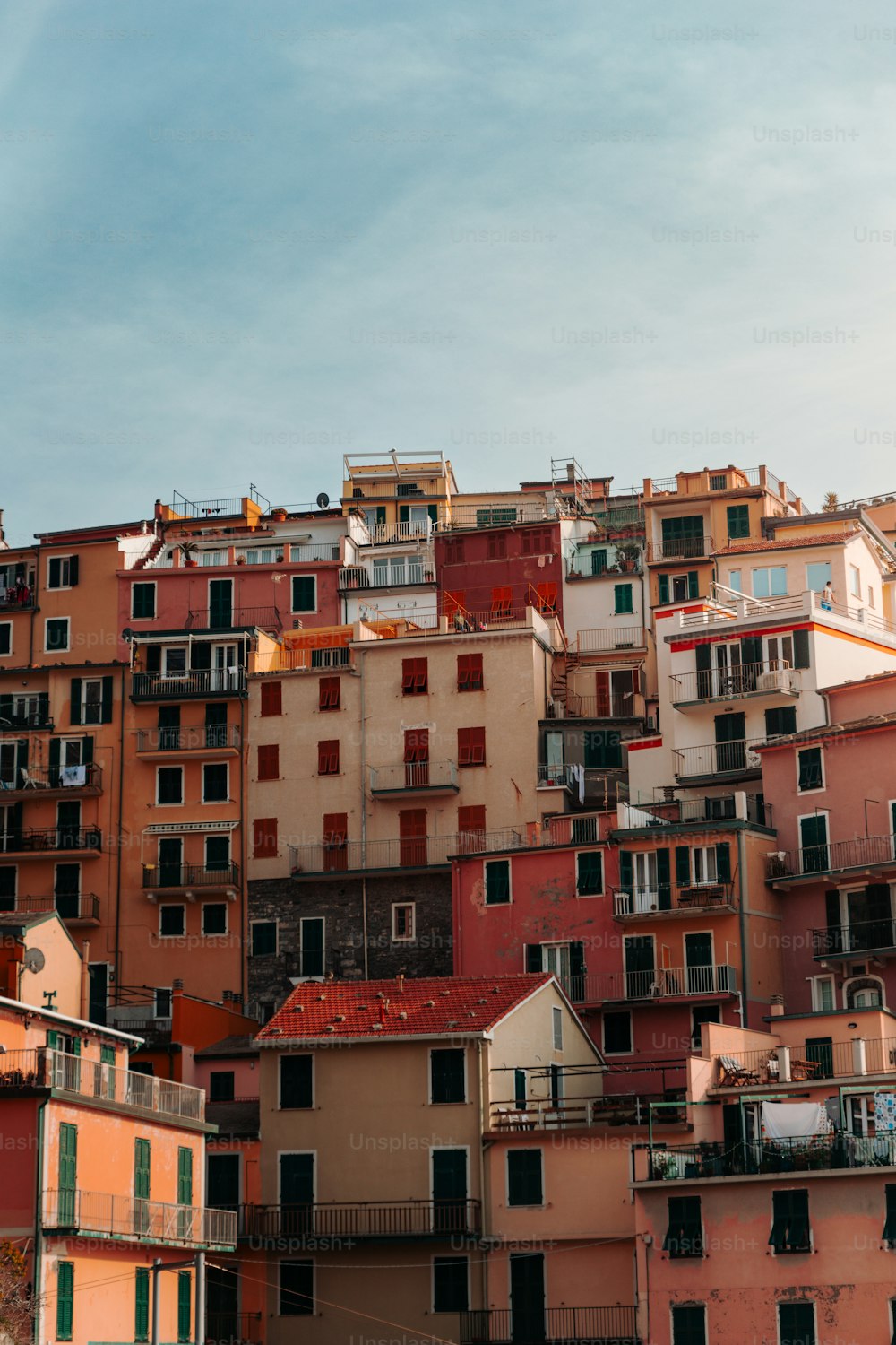 a very tall building with lots of windows and balconies