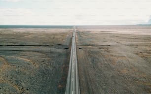 an aerial view of a highway in the middle of nowhere