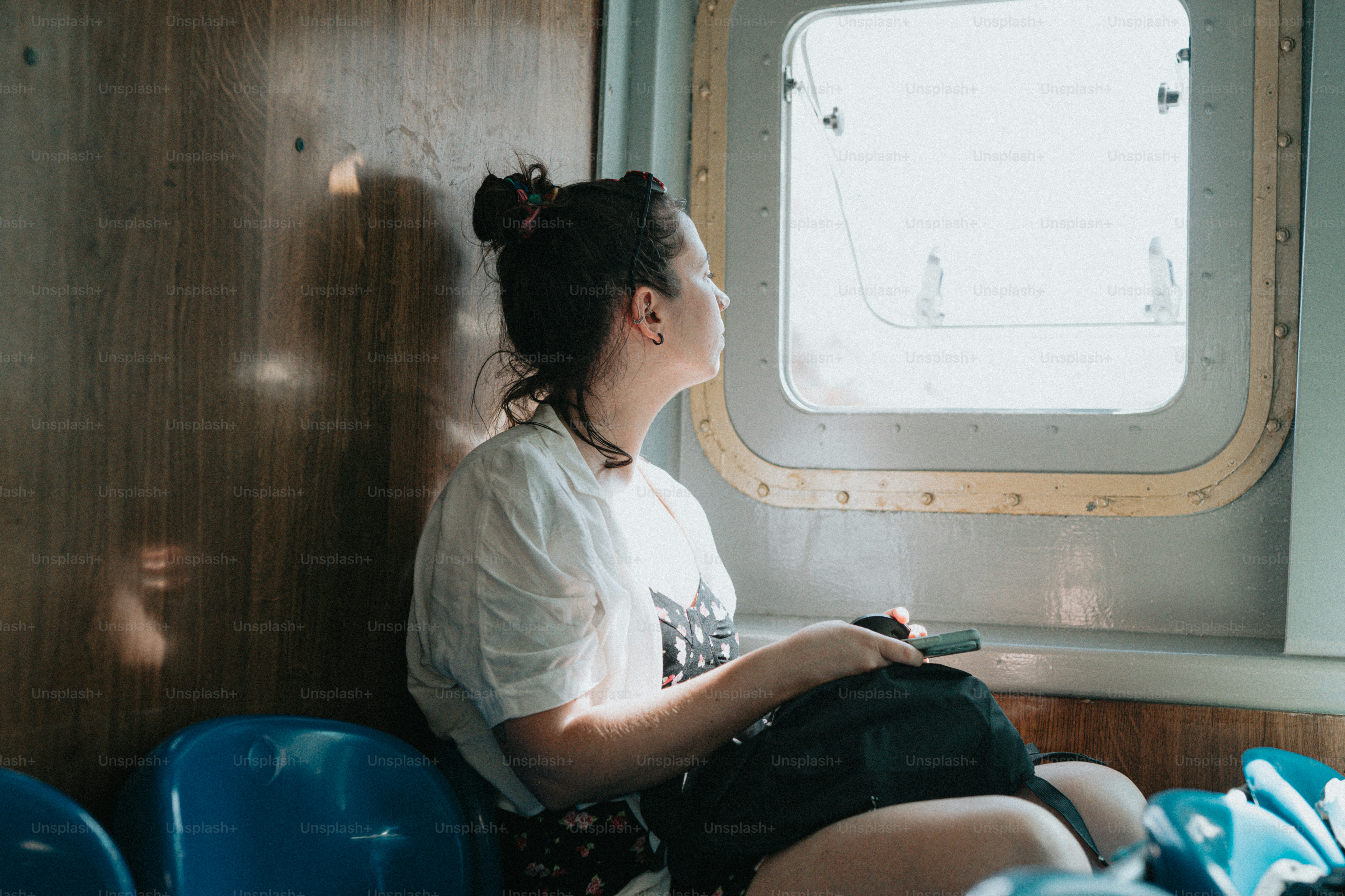 A woman wearing a red jacket and a red hat photo – Travel Image on Unsplash