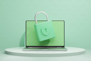 a green bag sitting on top of a laptop computer