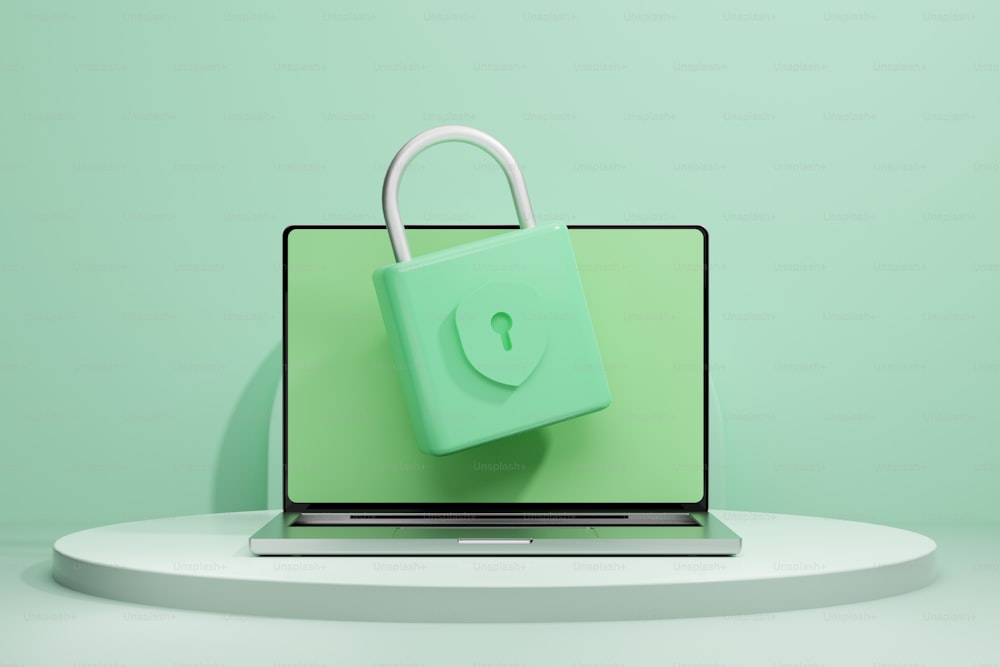 노트북 컴퓨터 위에 놓인 초록색 가방