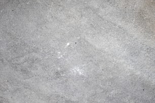 Un primer plano de una superficie de hormigón gris
