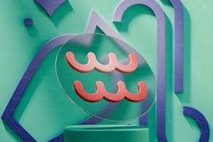 a circular object with pink shapes on a green background