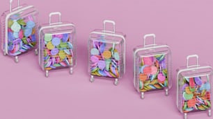 a group of suitcases filled with paper flowers