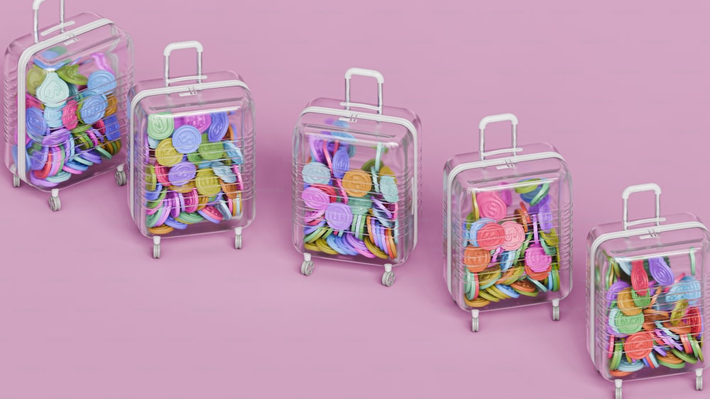 a group of suitcases filled with paper flowers