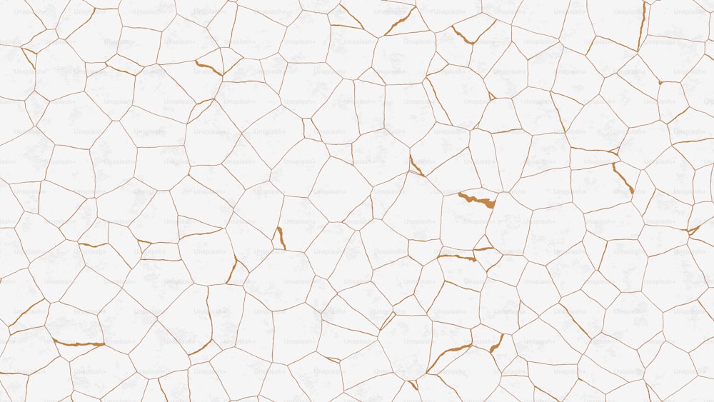 a white and gold background with cracks in it