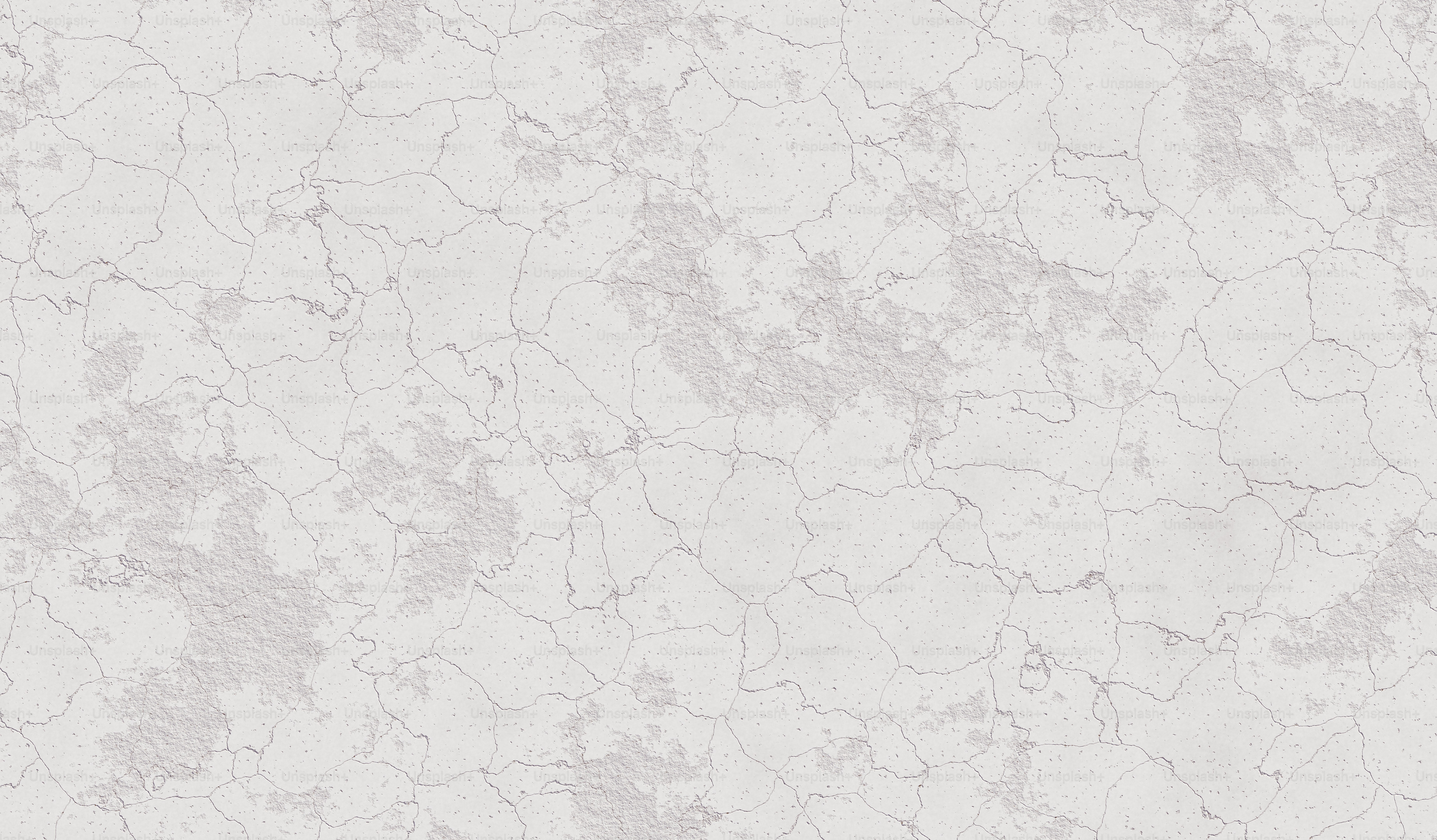 a close up of a white marble wallpaper