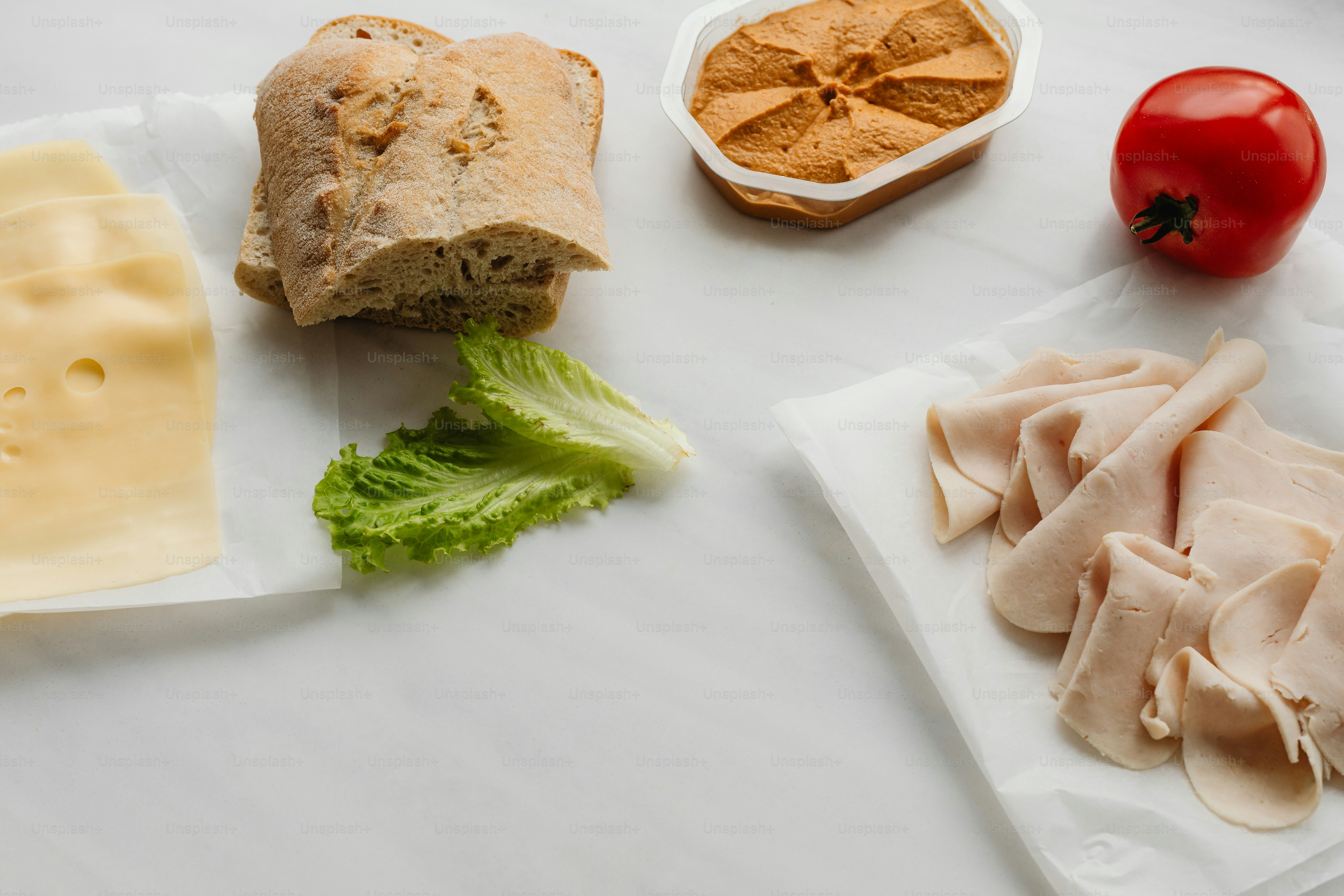 a white table topped with different types of food