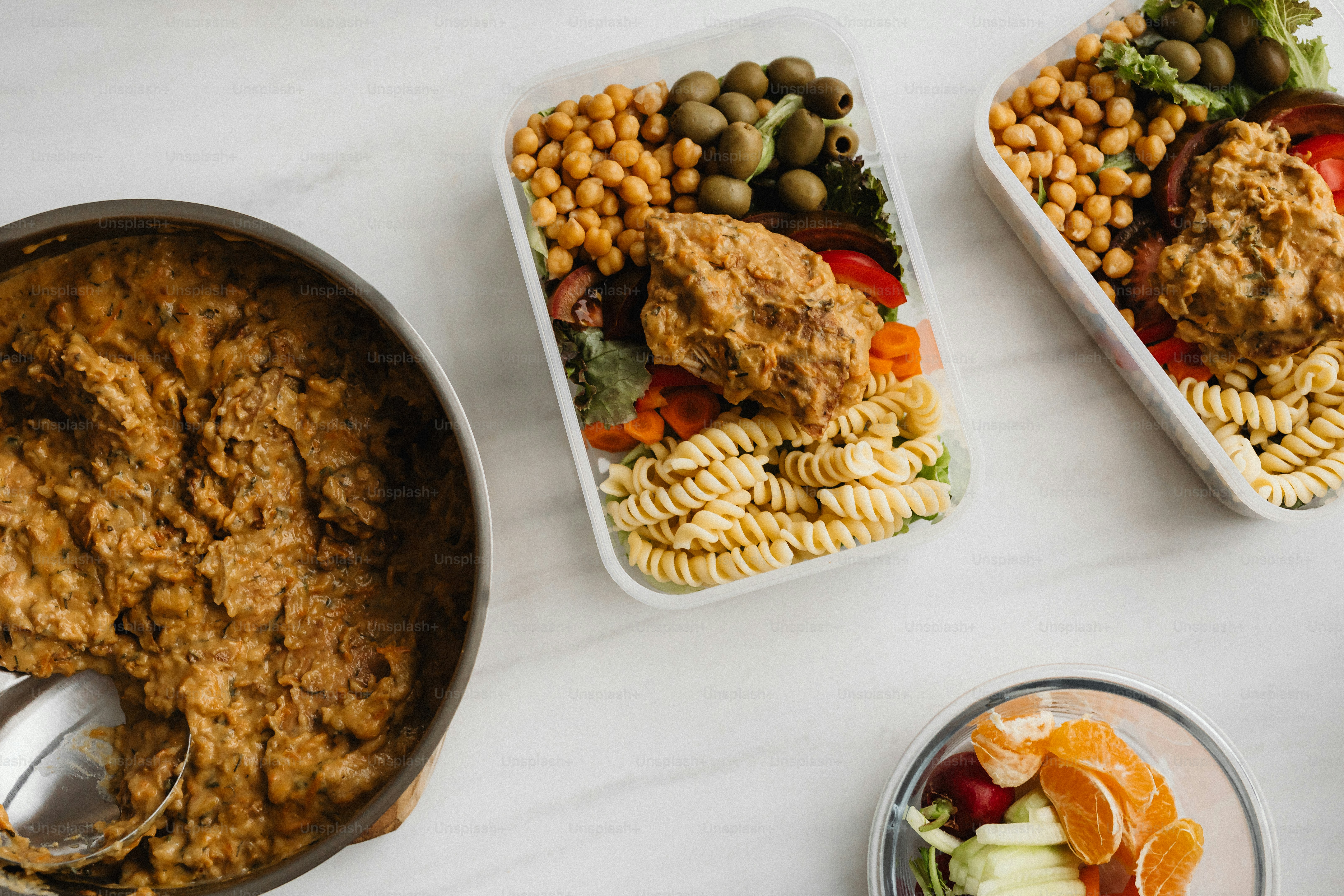 A table topped with lots of different types of food photo – Meal ...