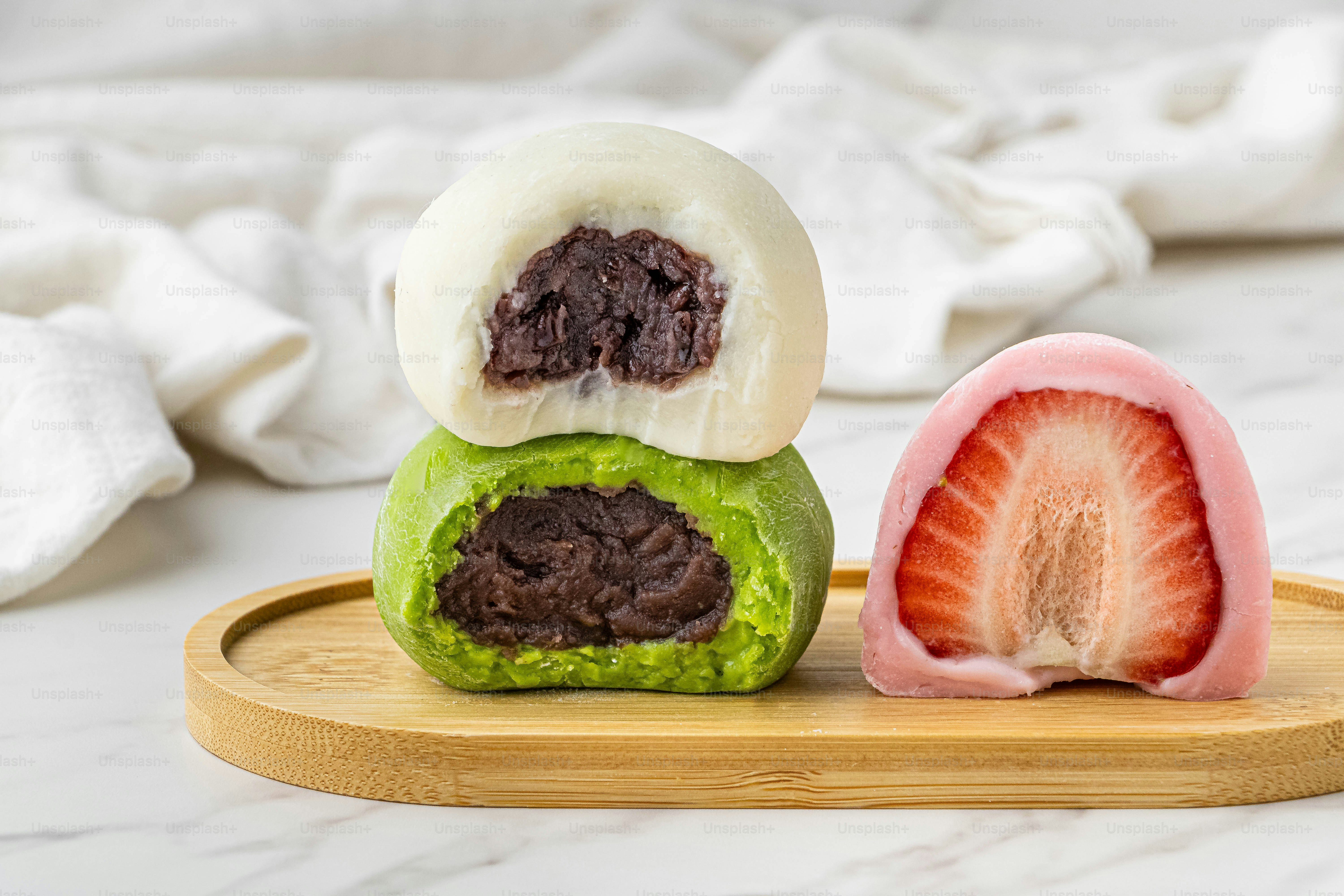 a couple of fruits sitting on top of a wooden tray