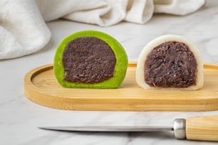 a piece of cake sitting on top of a cutting board