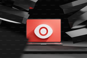 una computadora portátil con un logotipo rojo en la pantalla
