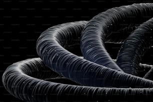 a black and white photo of a bunch of hoses