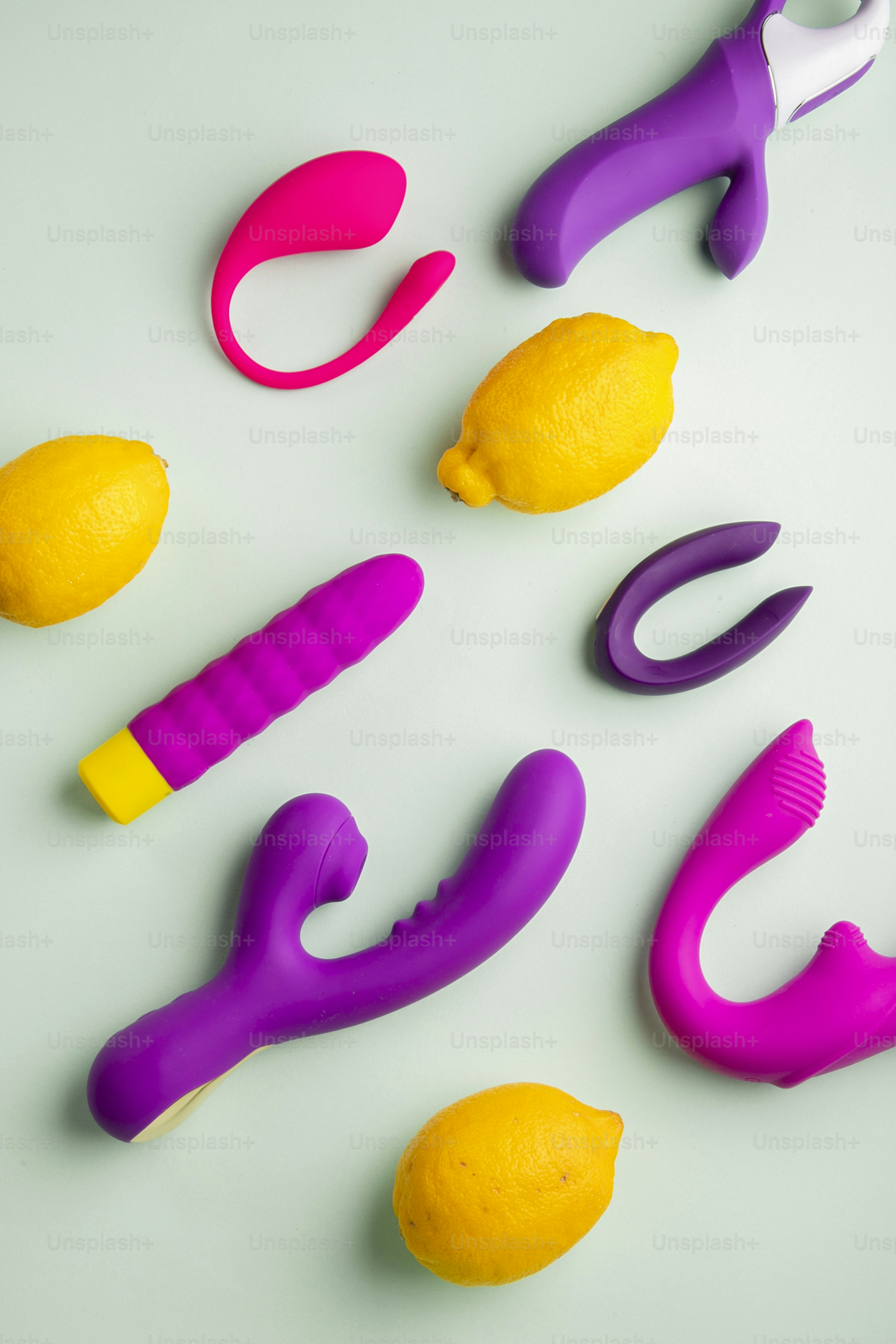 a group of different colored toys on a table