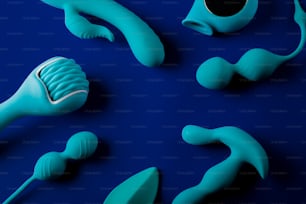 a group of blue objects sitting on top of a blue surface