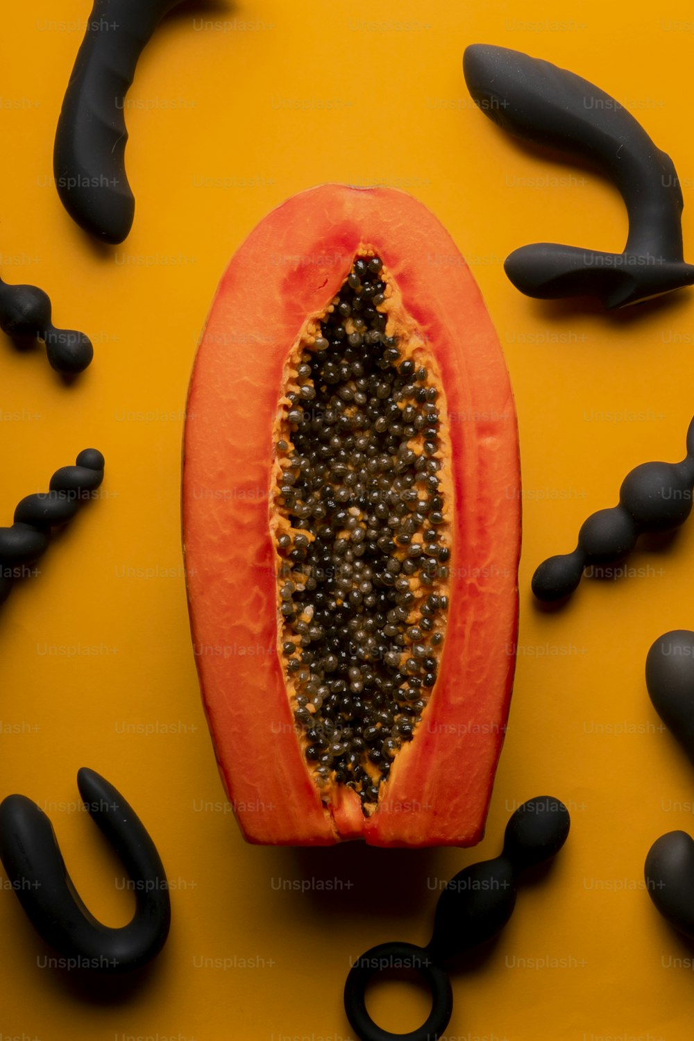 a half of a papaya sitting on top of a table
