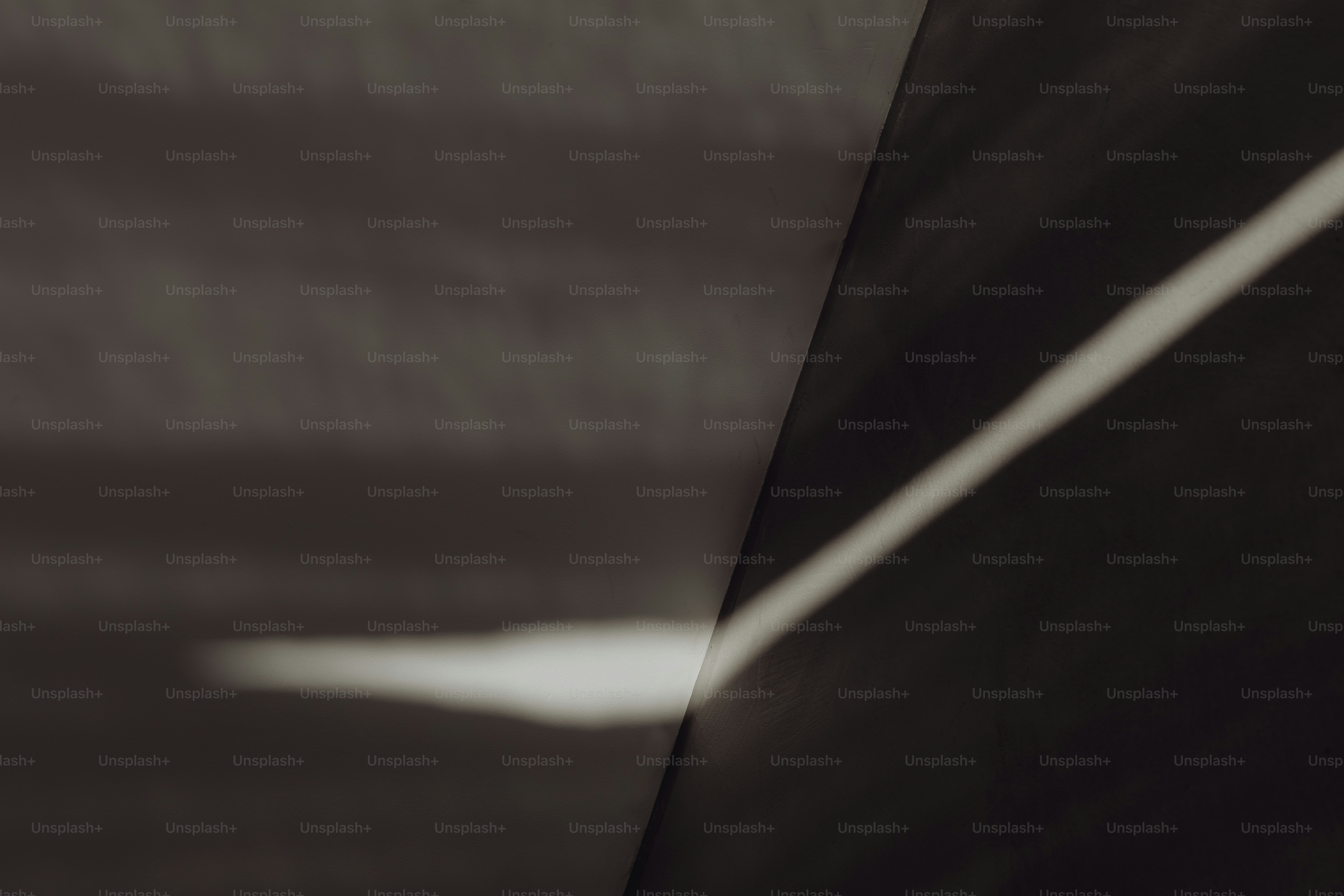 a black and white photo of the side of a building