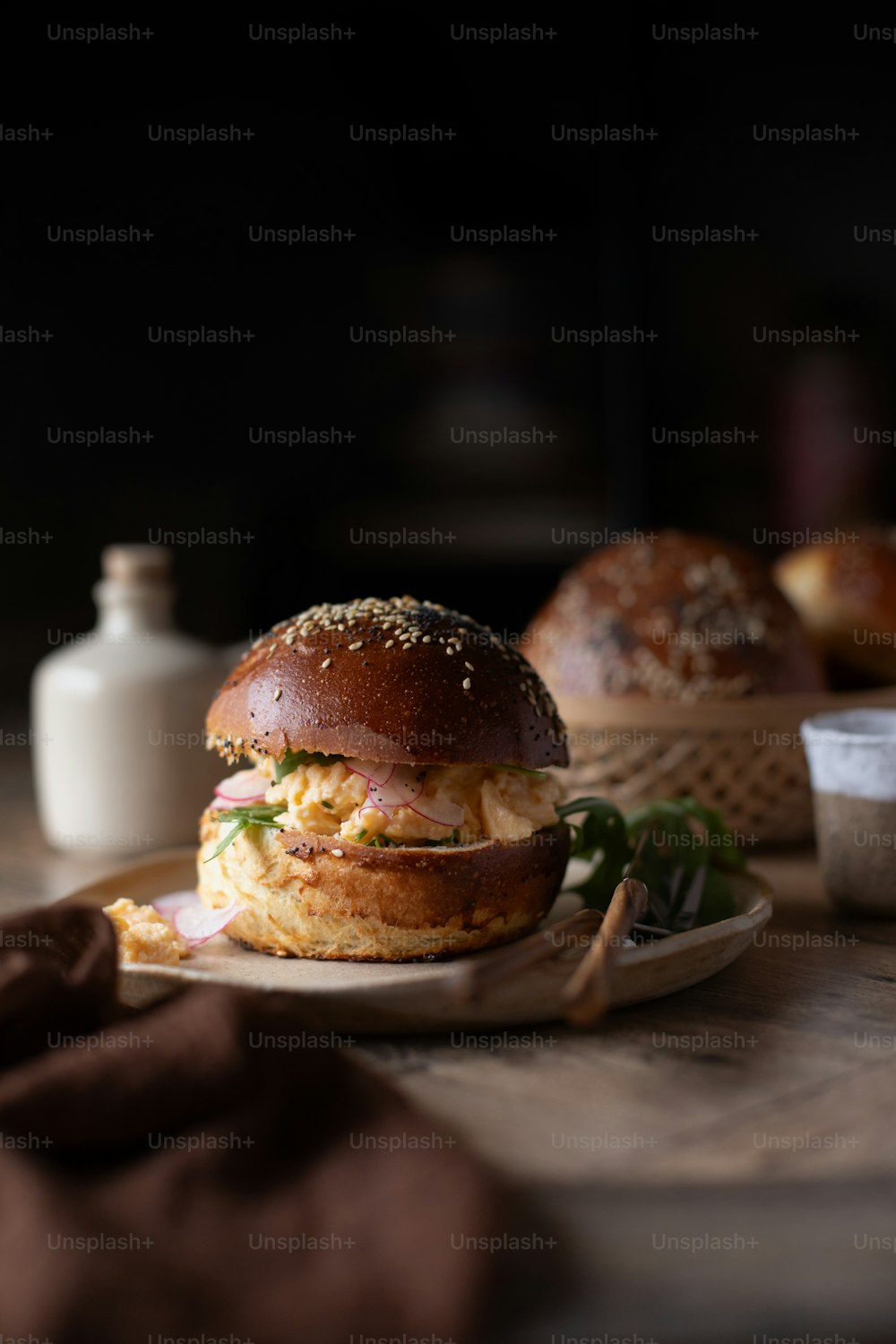 a plate with a sandwich on it on a table