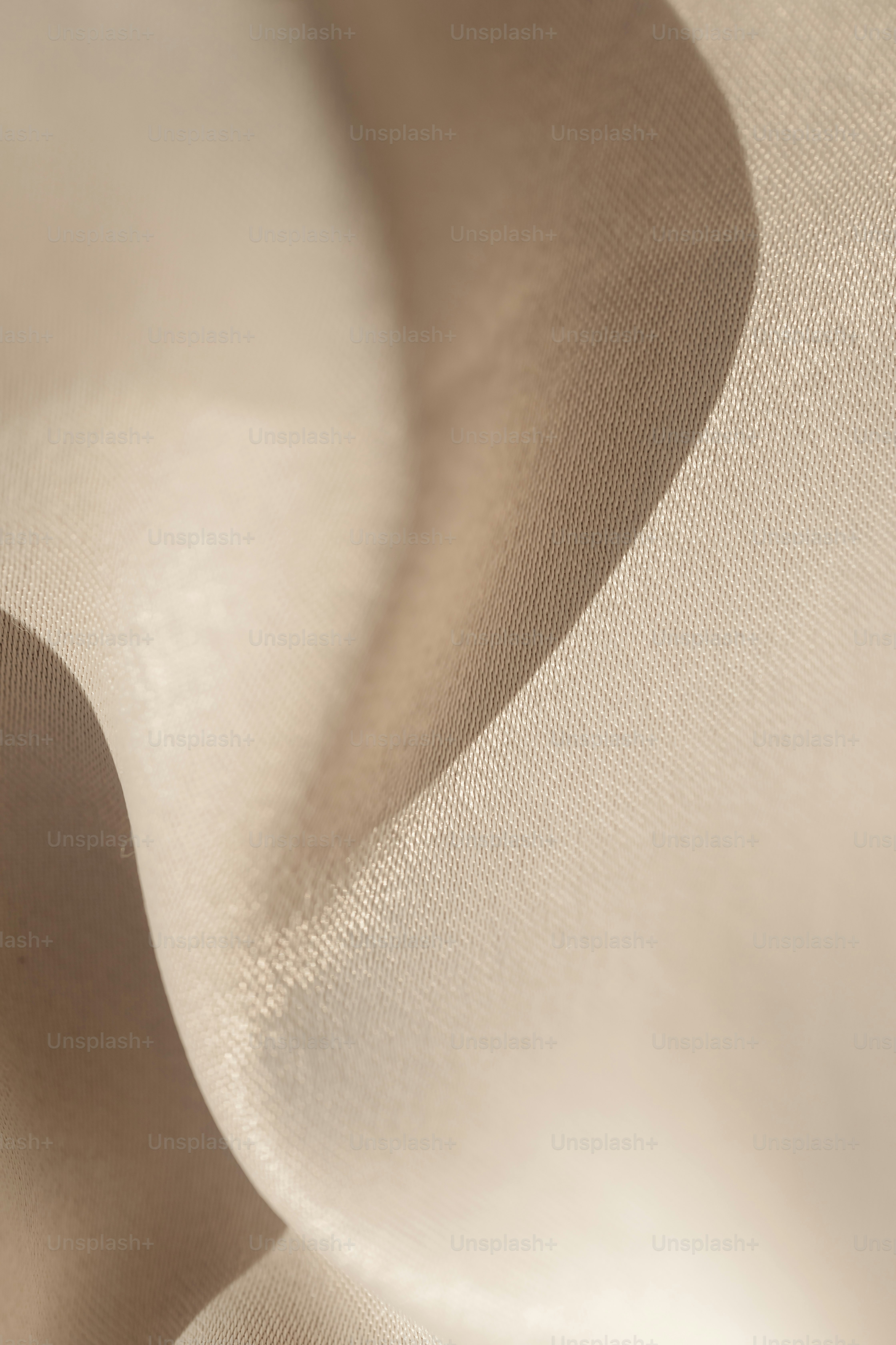 a close up view of a white fabric