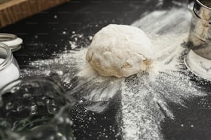 a ball of dough sitting on top of a table