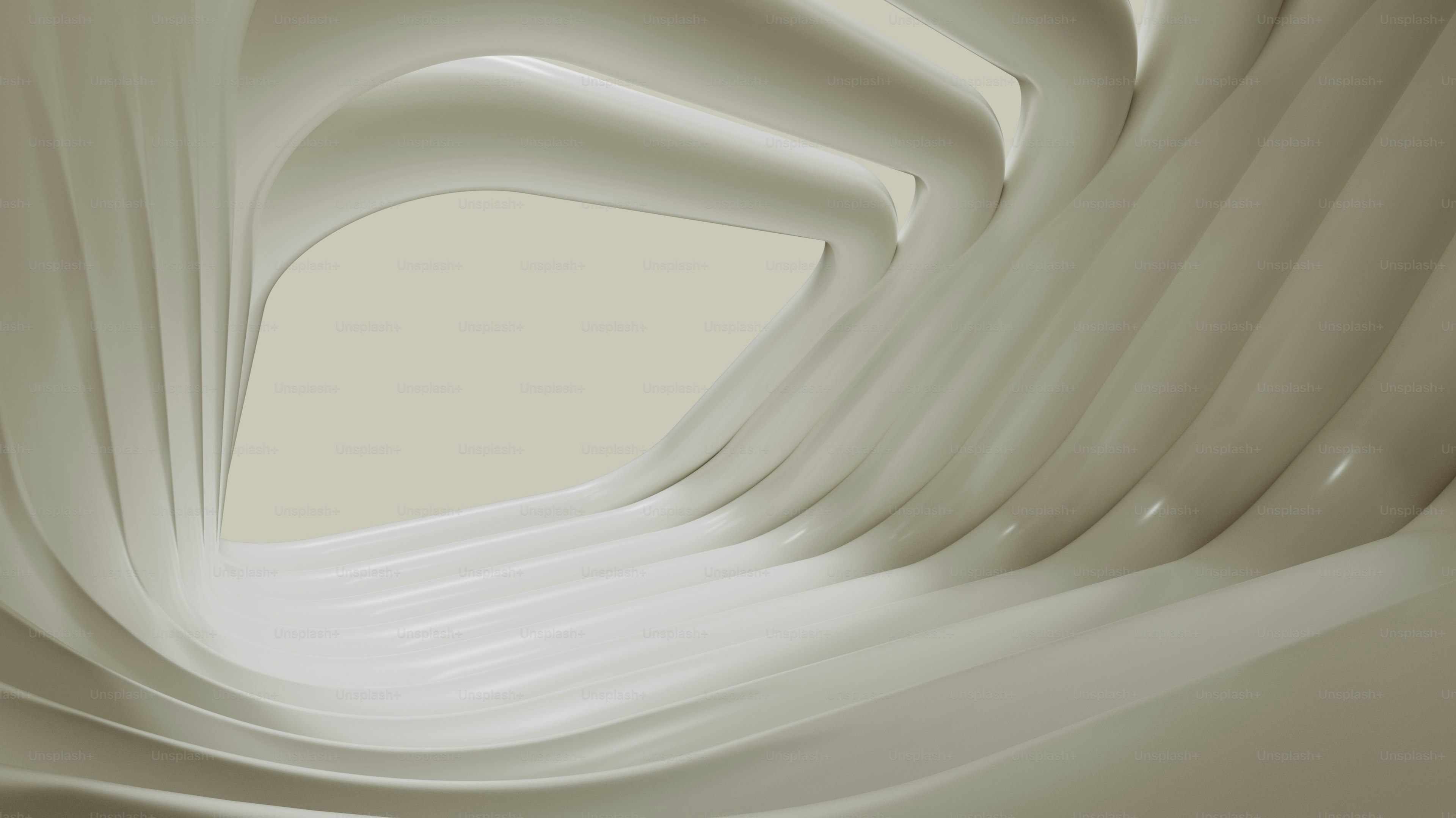 Una foto abstracta de una pared blanca curva