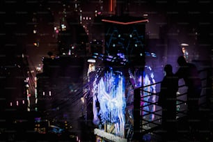 a group of people standing on top of a bridge