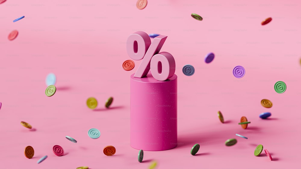 a pink tube with a percentage sign sticking out of it surrounded by confetti