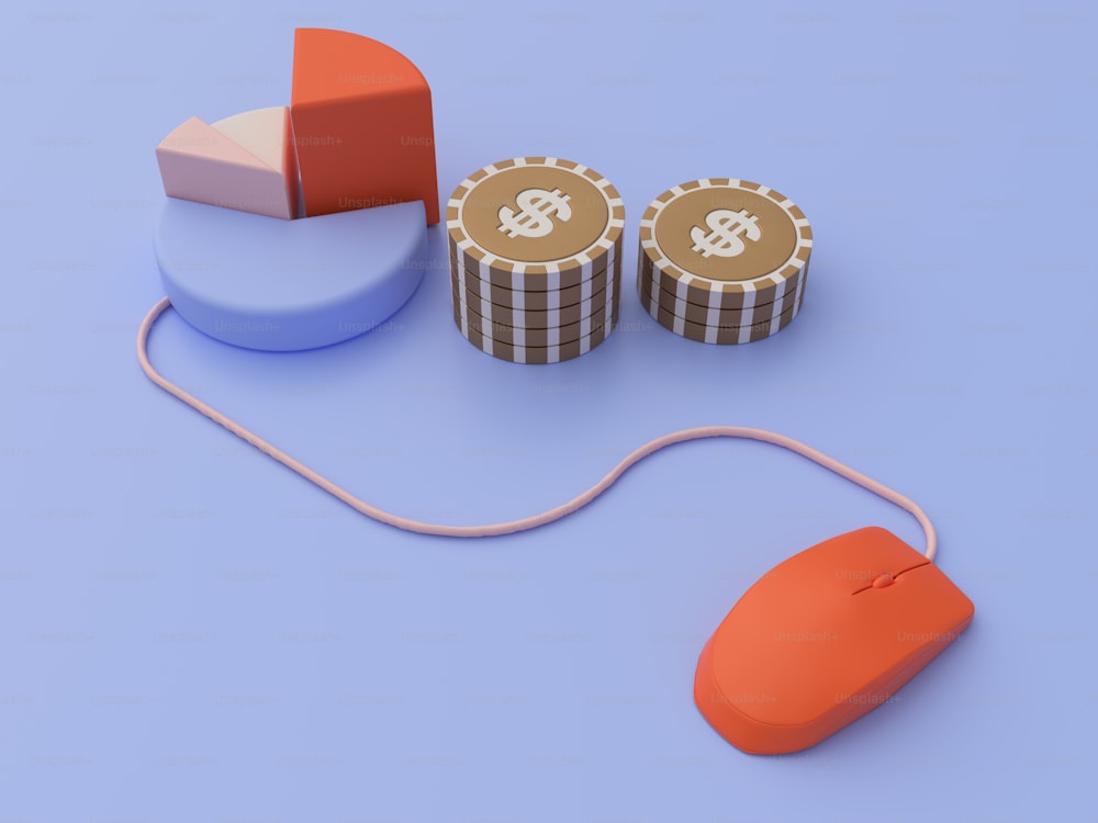 a computer mouse sitting next to two stacks of coins