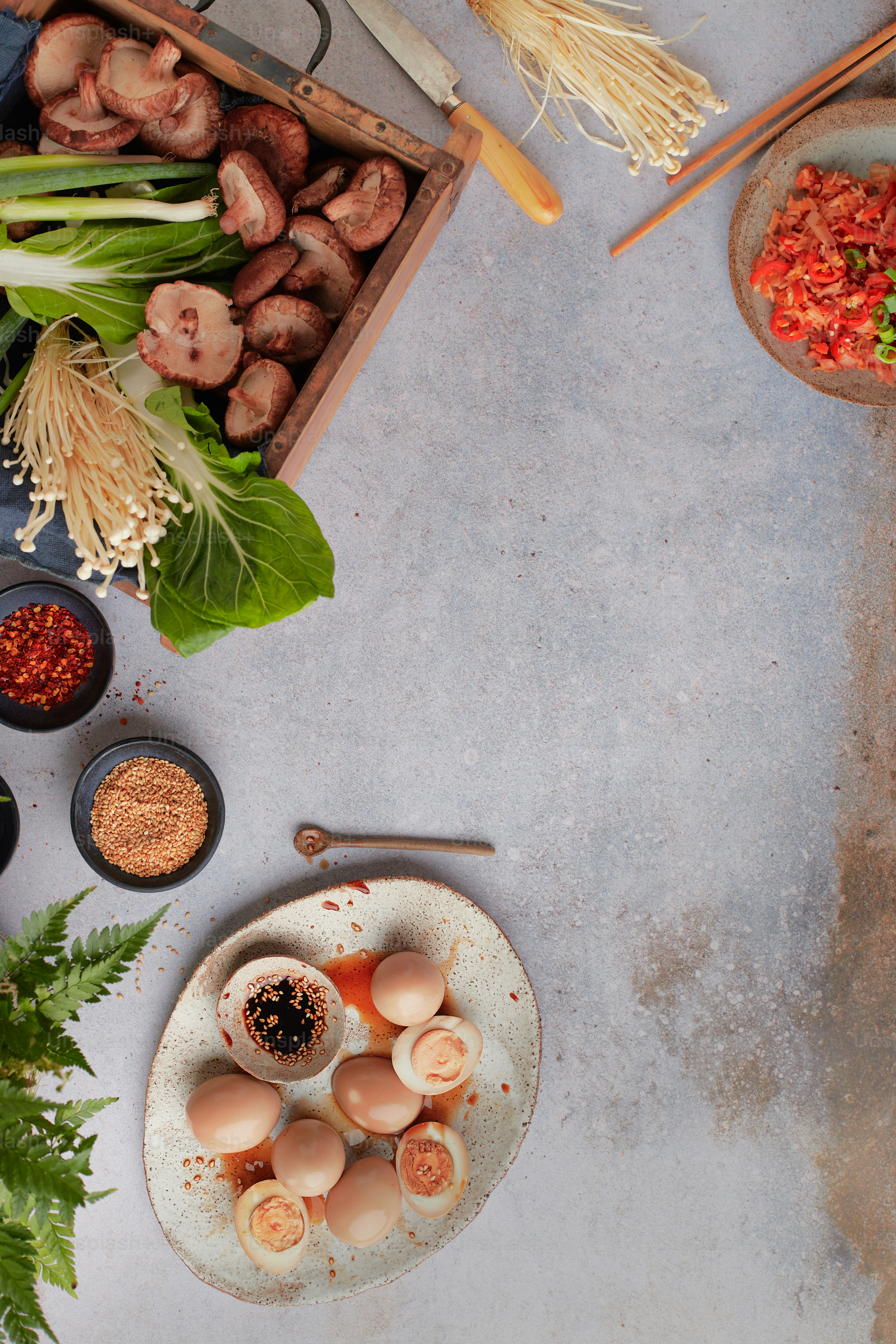 a table topped with bowls filled with food