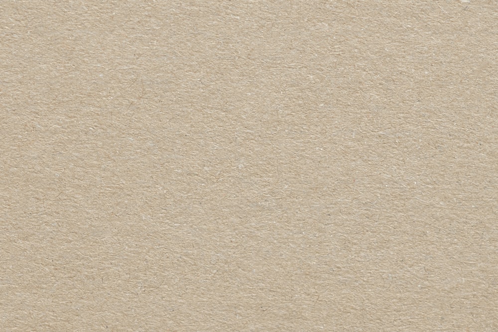 a brown paper textured with a white background