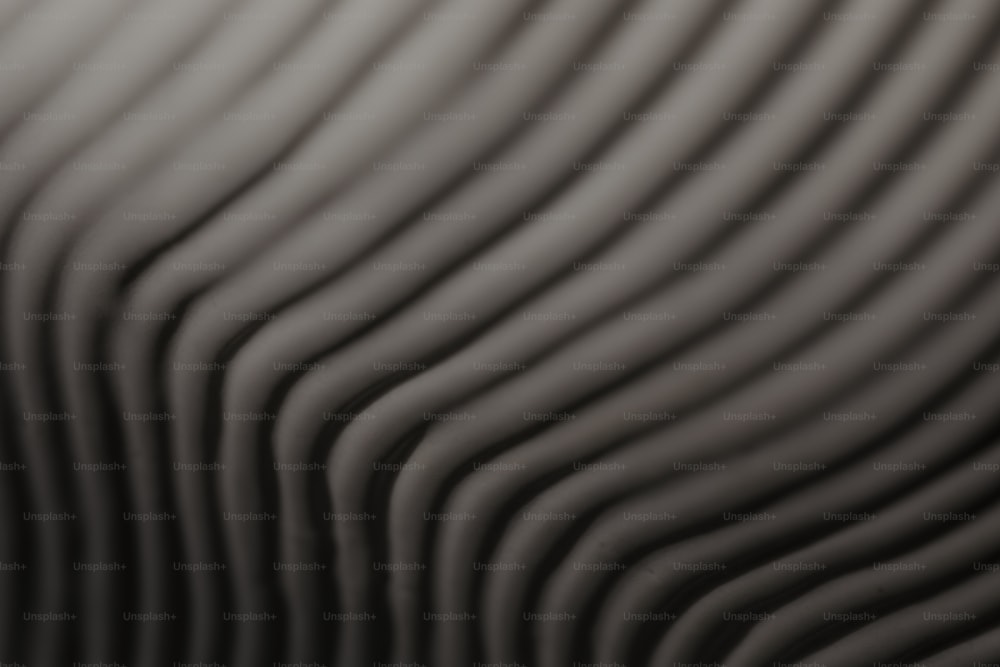 a black and white photo of wavy lines