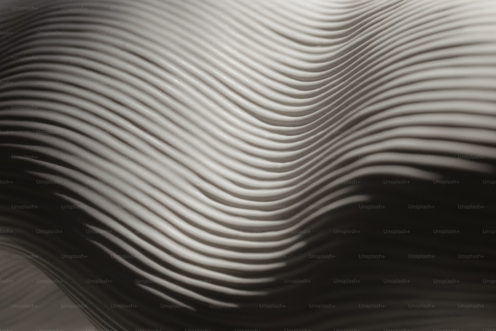 Ein Schwarz-Weiß-Foto mit wellenförmigen Linien