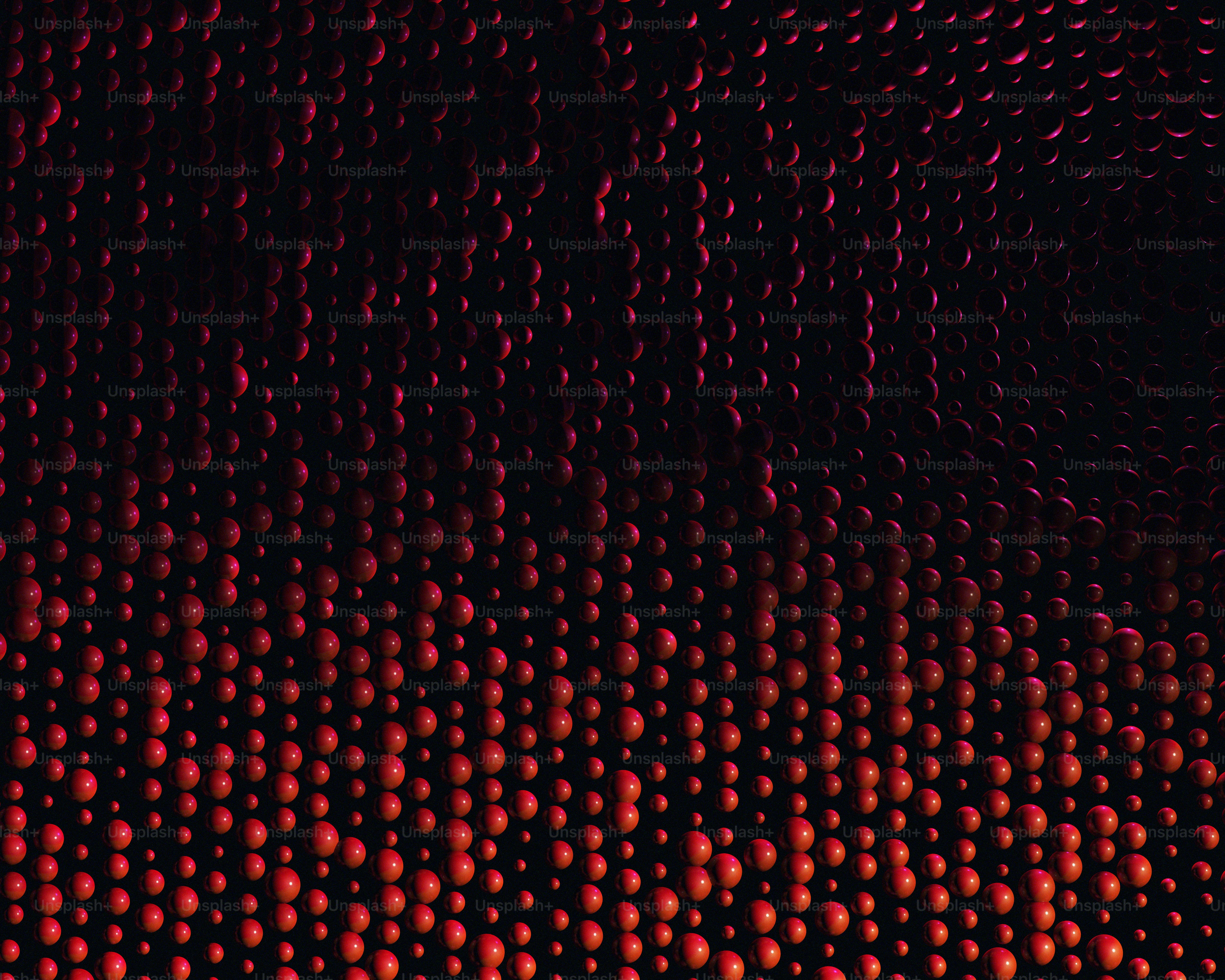 a close up of a red and black background