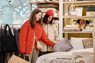 two women in a store looking at items