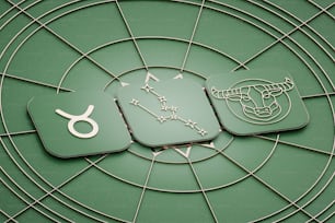 a close up of a clock on a green surface