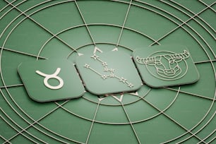 a close up of a clock on a green surface