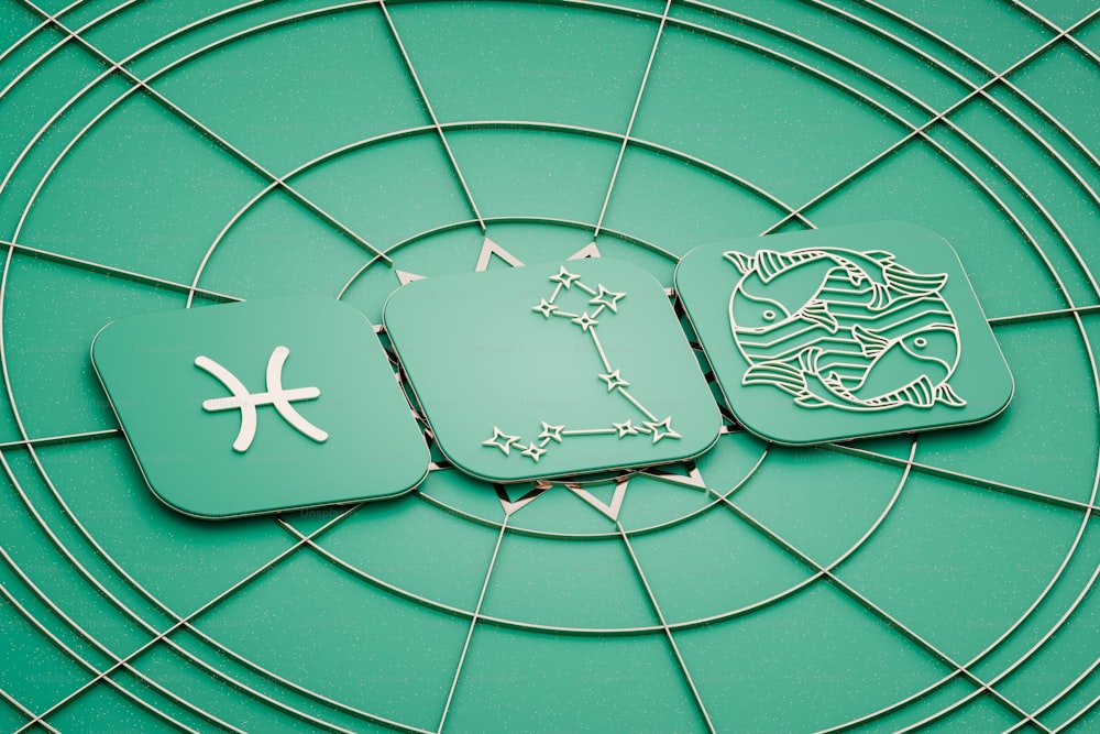 a close up of a clock on a green surface