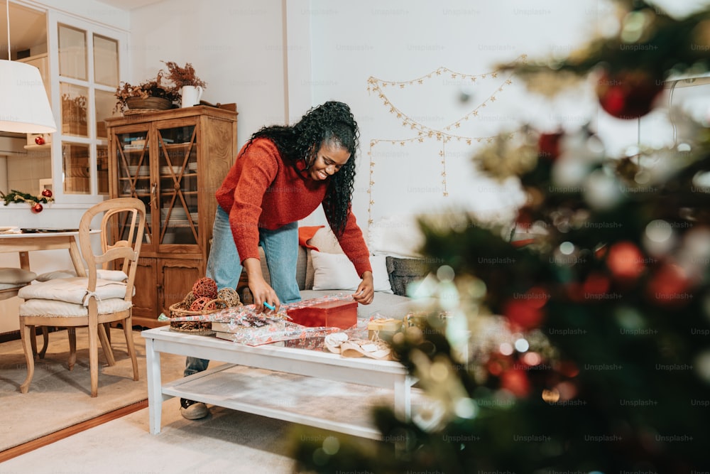 a woman in a red shirt is making food