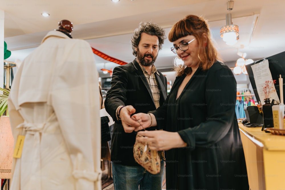 a man and a woman looking at a mannequin