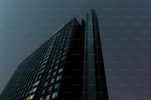 a tall building with a sky background