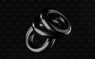 Ein Schwarz-Weiß-Foto von zwei Ringen