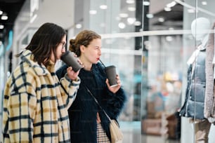 a couple of women standing next to each other