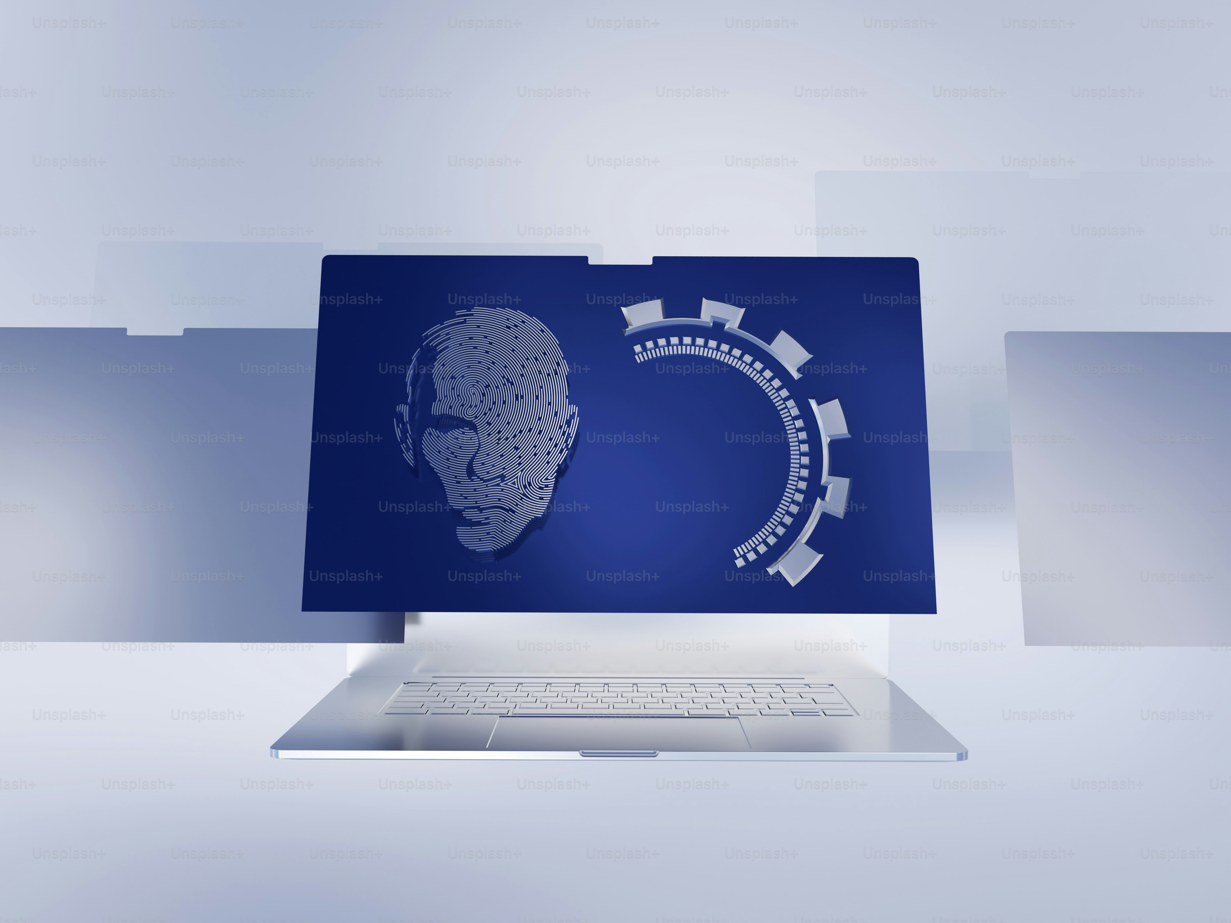 laptop dengan gambar wajah seorang pria di layar
