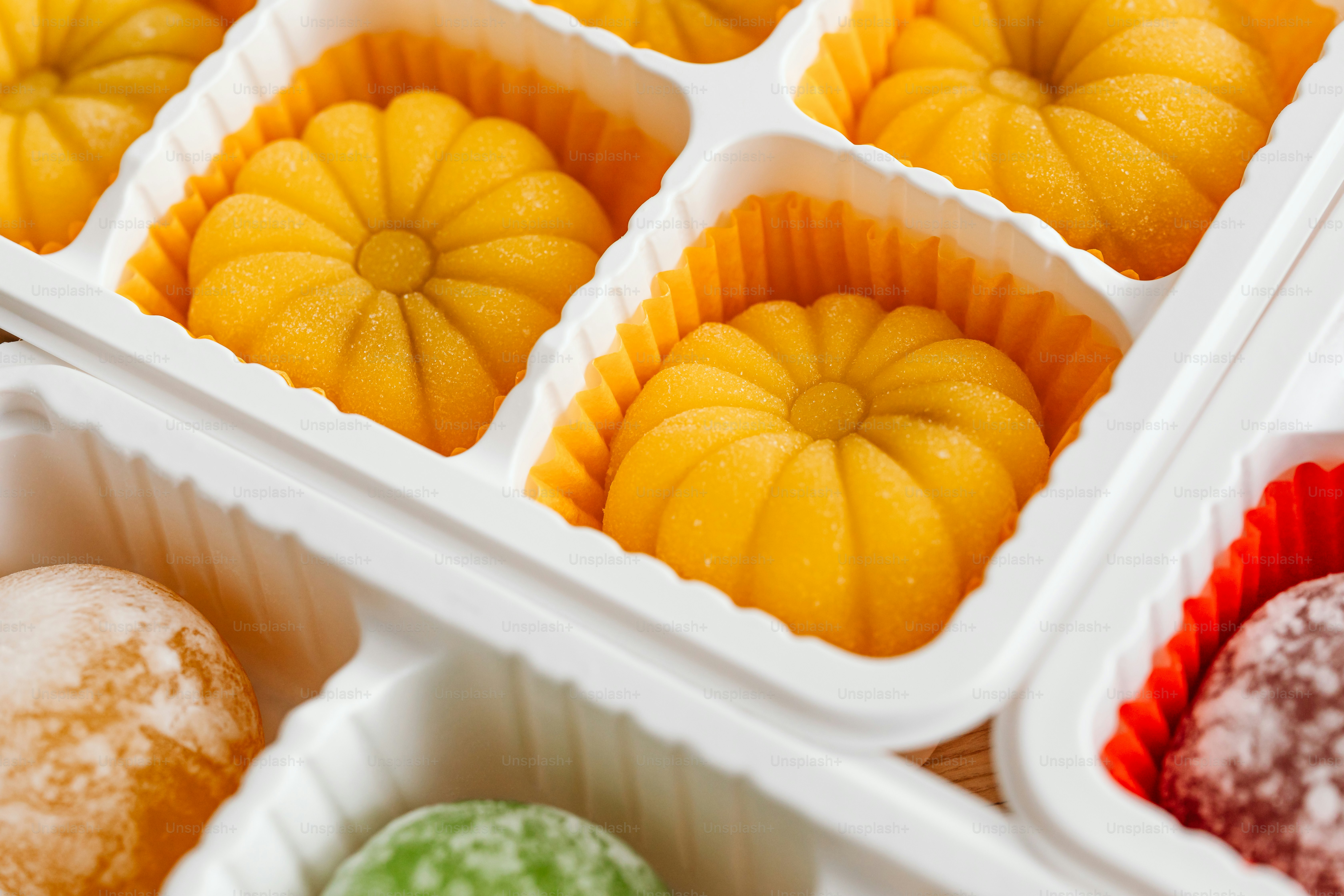 a close up of a tray of pastries