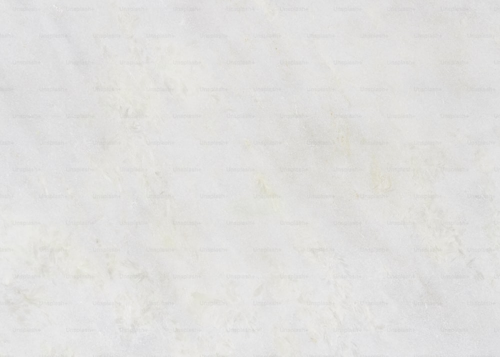 a white marble textured background or wallpaper