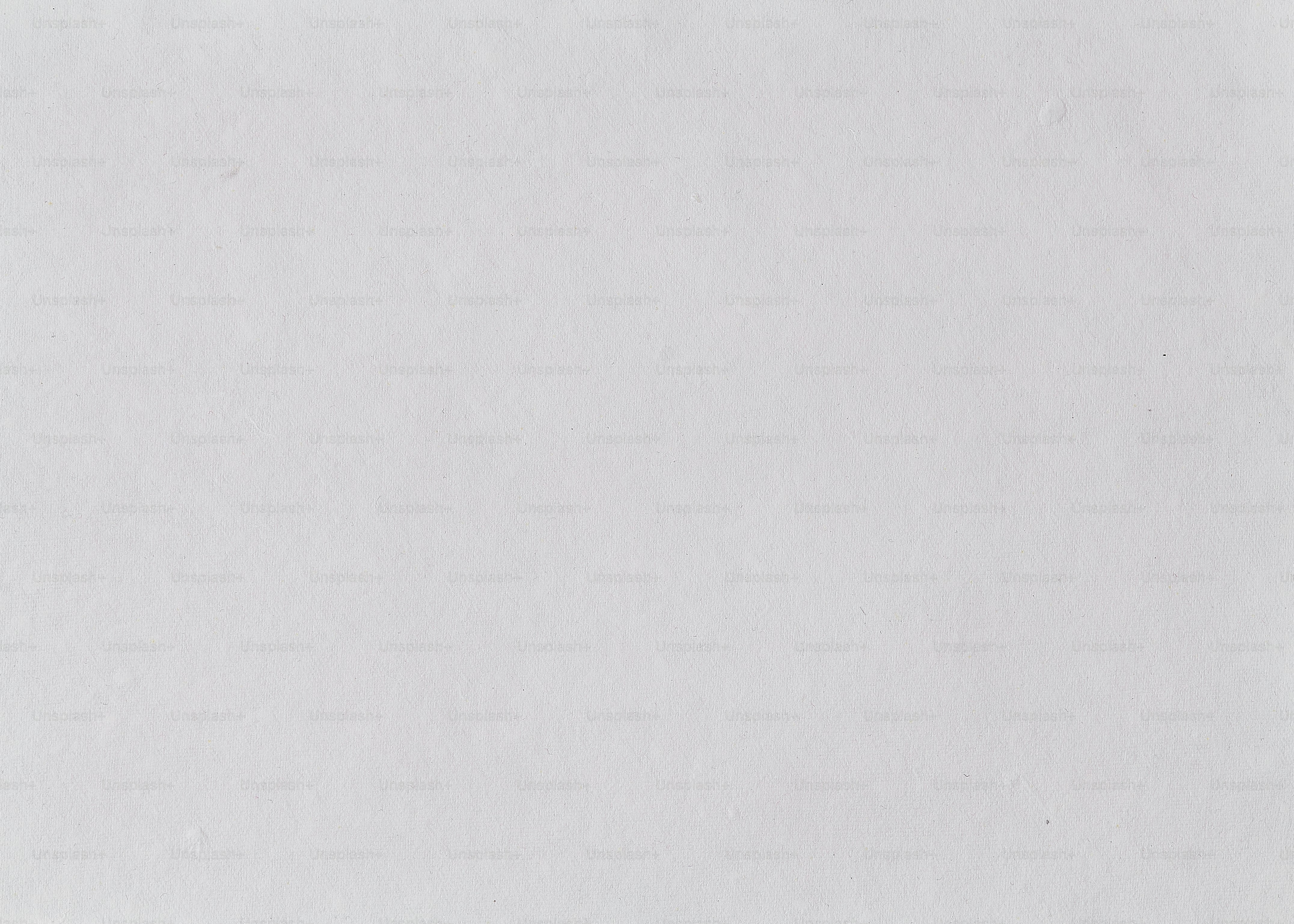 a black and white photo of an airplane flying in the sky